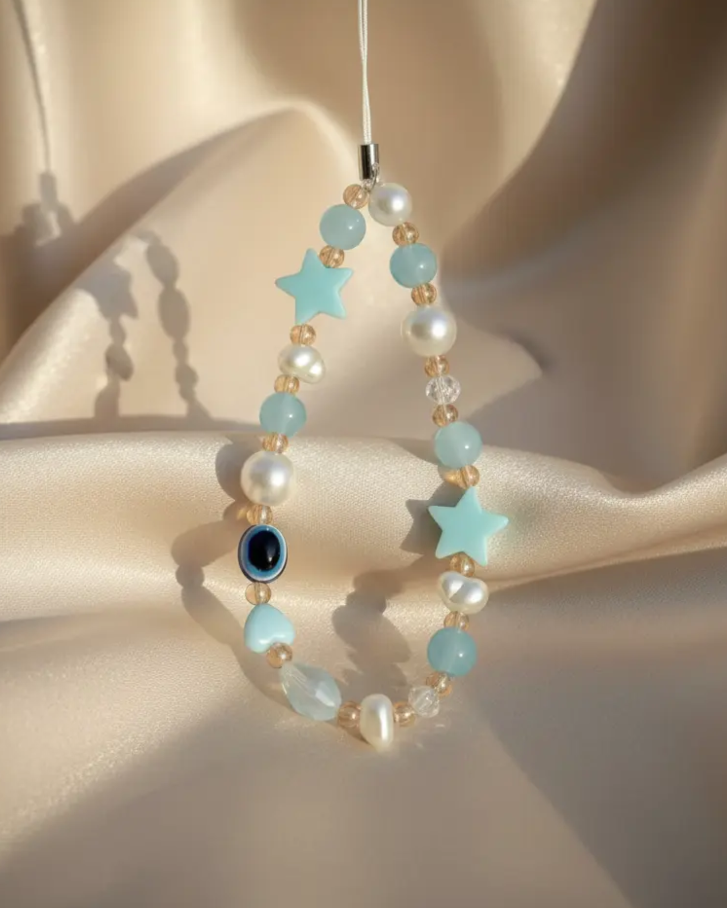 blue beaded phone charm for smartphone