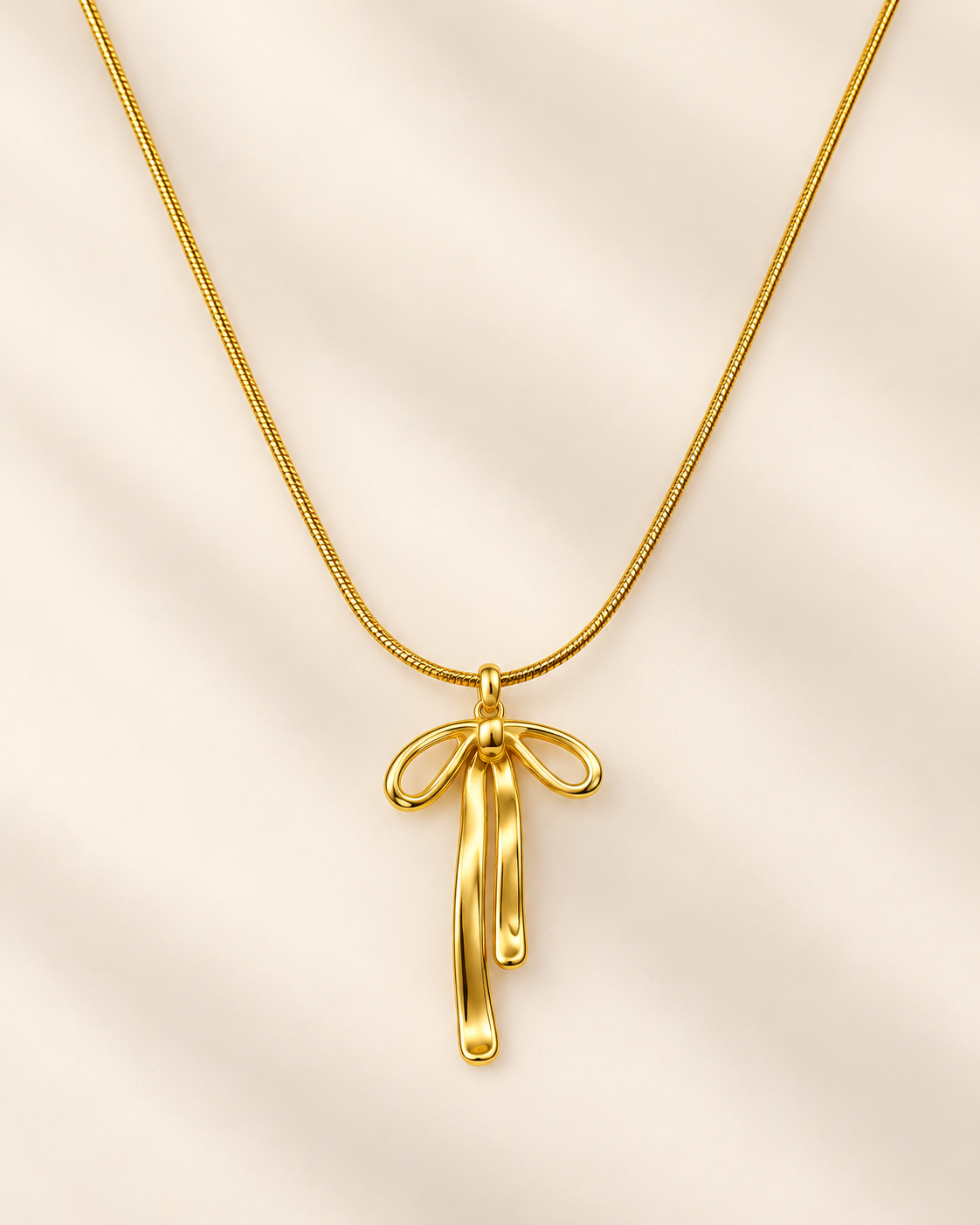 Golden Bow Pendant Necklace