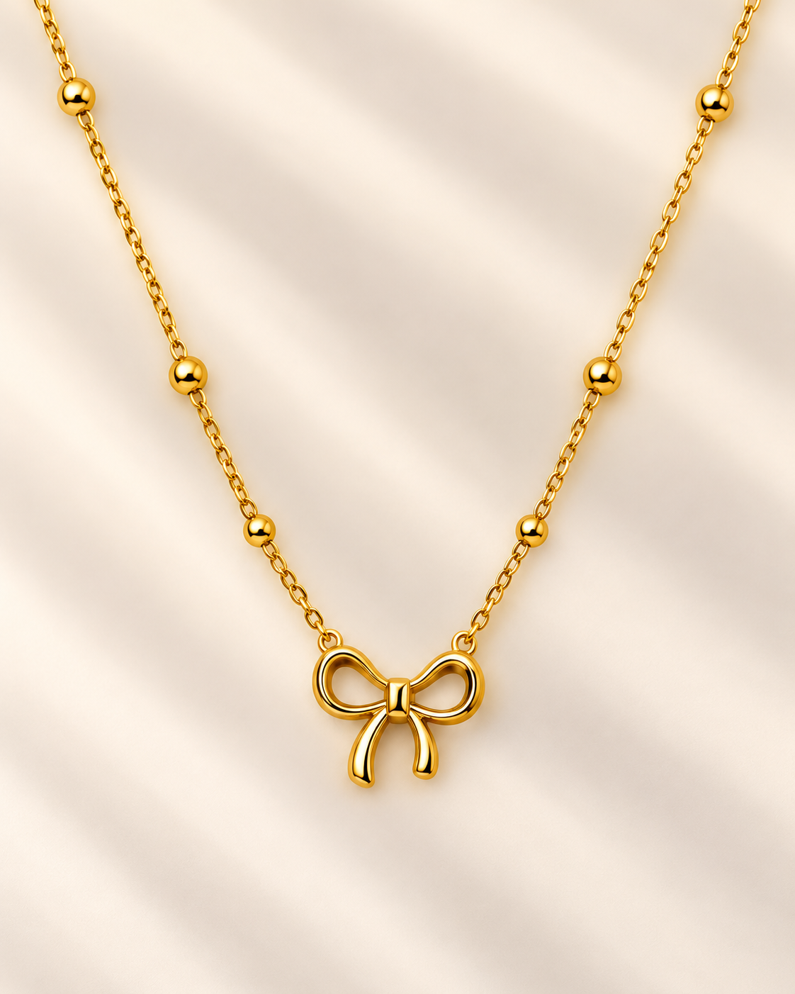 Golden Bow Charm Necklace