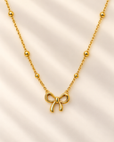Golden Bow Charm Necklace