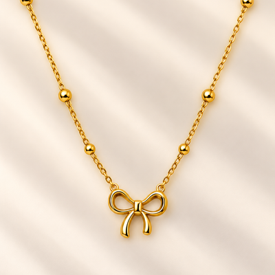 Golden Bow Charm Necklace