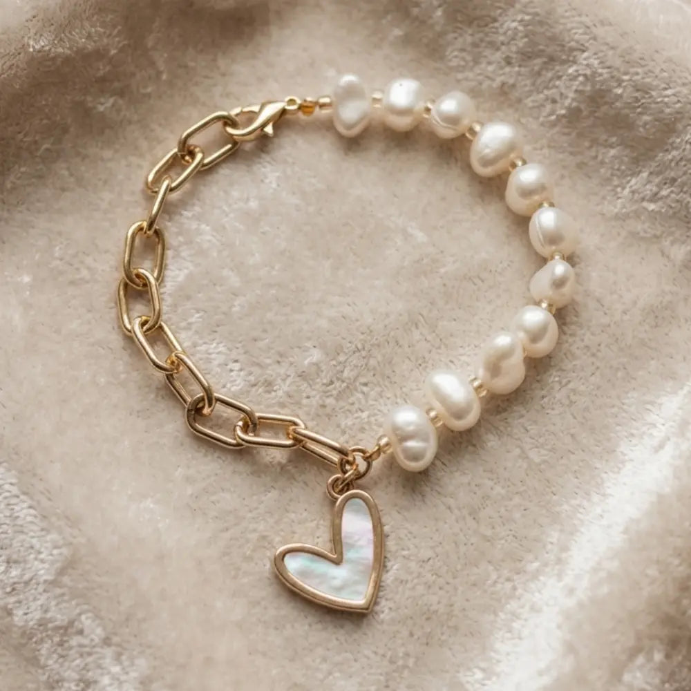 Pearl bracelet with gold chain and heart charm 