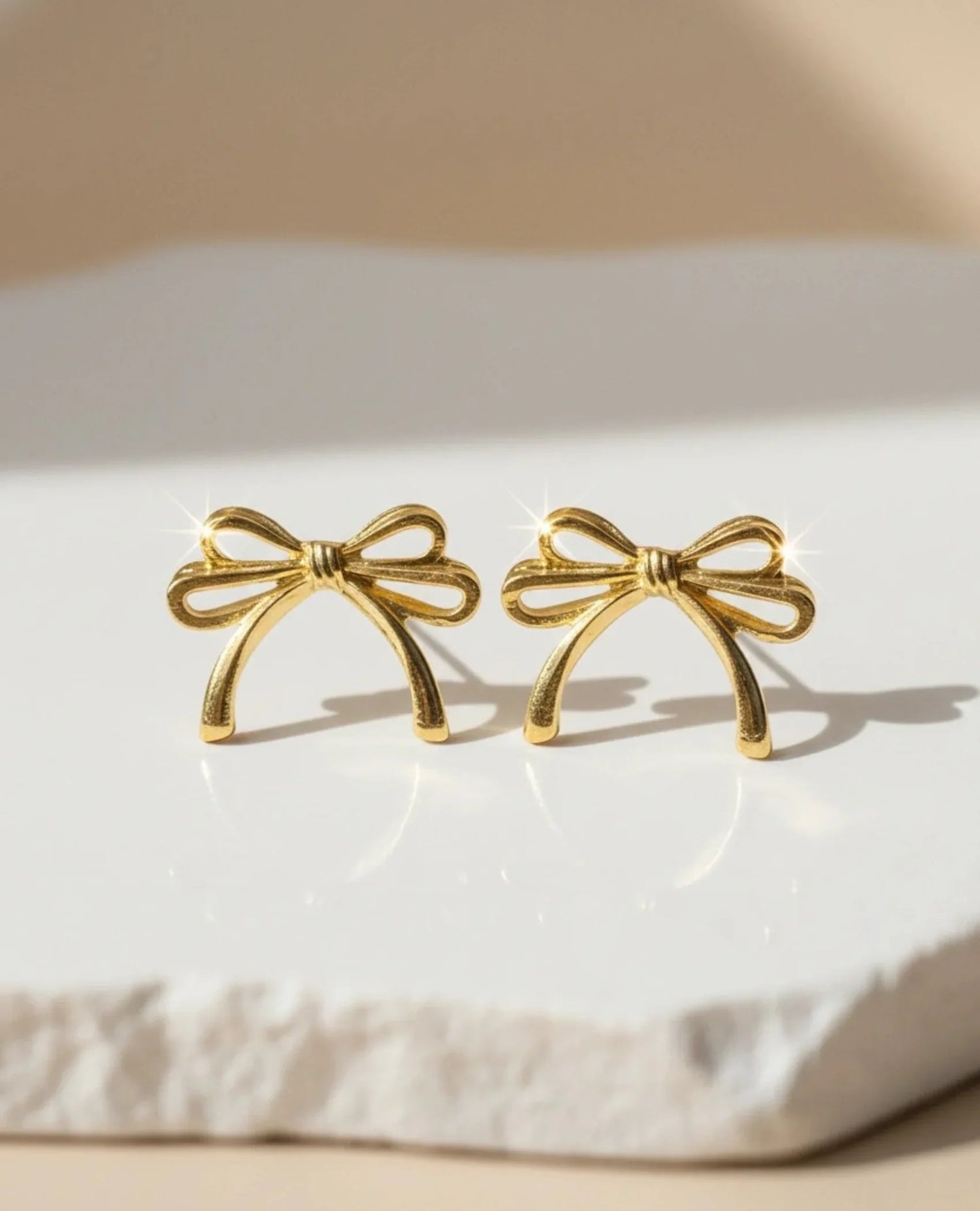 gold bow stud earrings for women