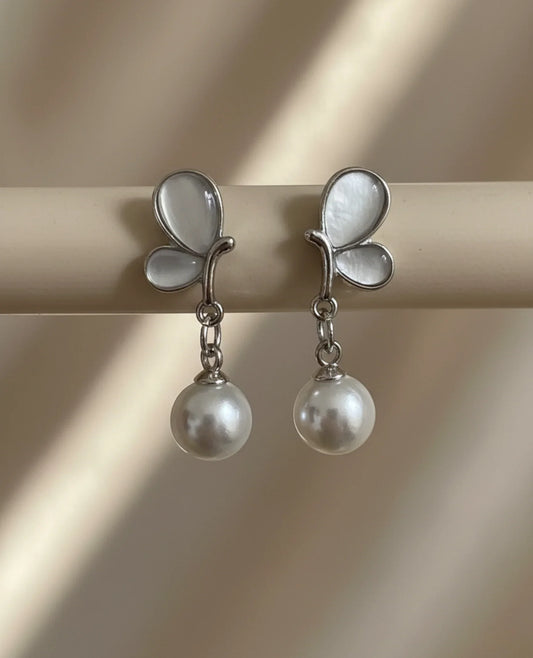 whale tail and pearl stud earrings