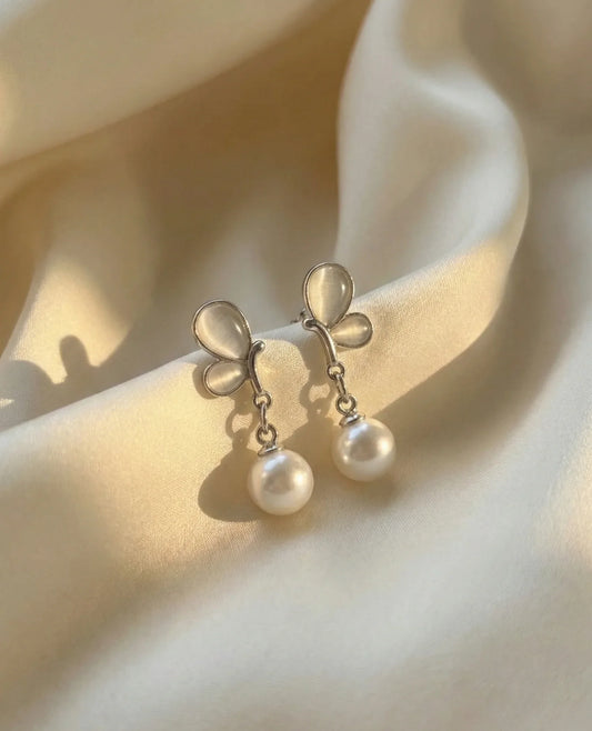 whale tail and pearl stud earrings
